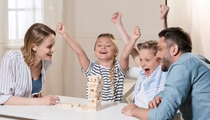 family playing jenga